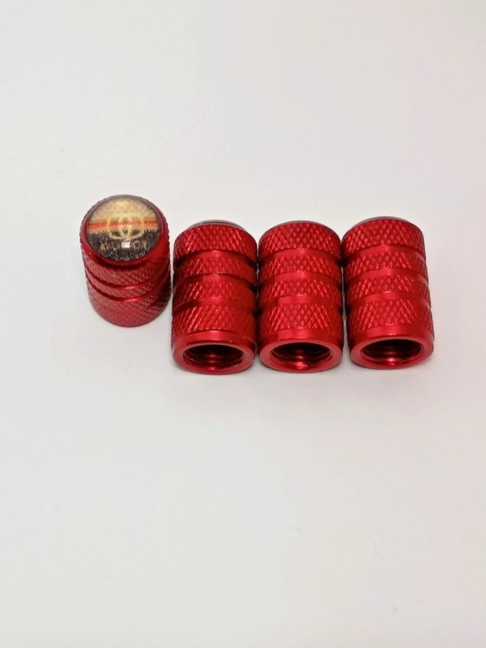 Gucci Red Textured Metal Tire Caps Set of 4